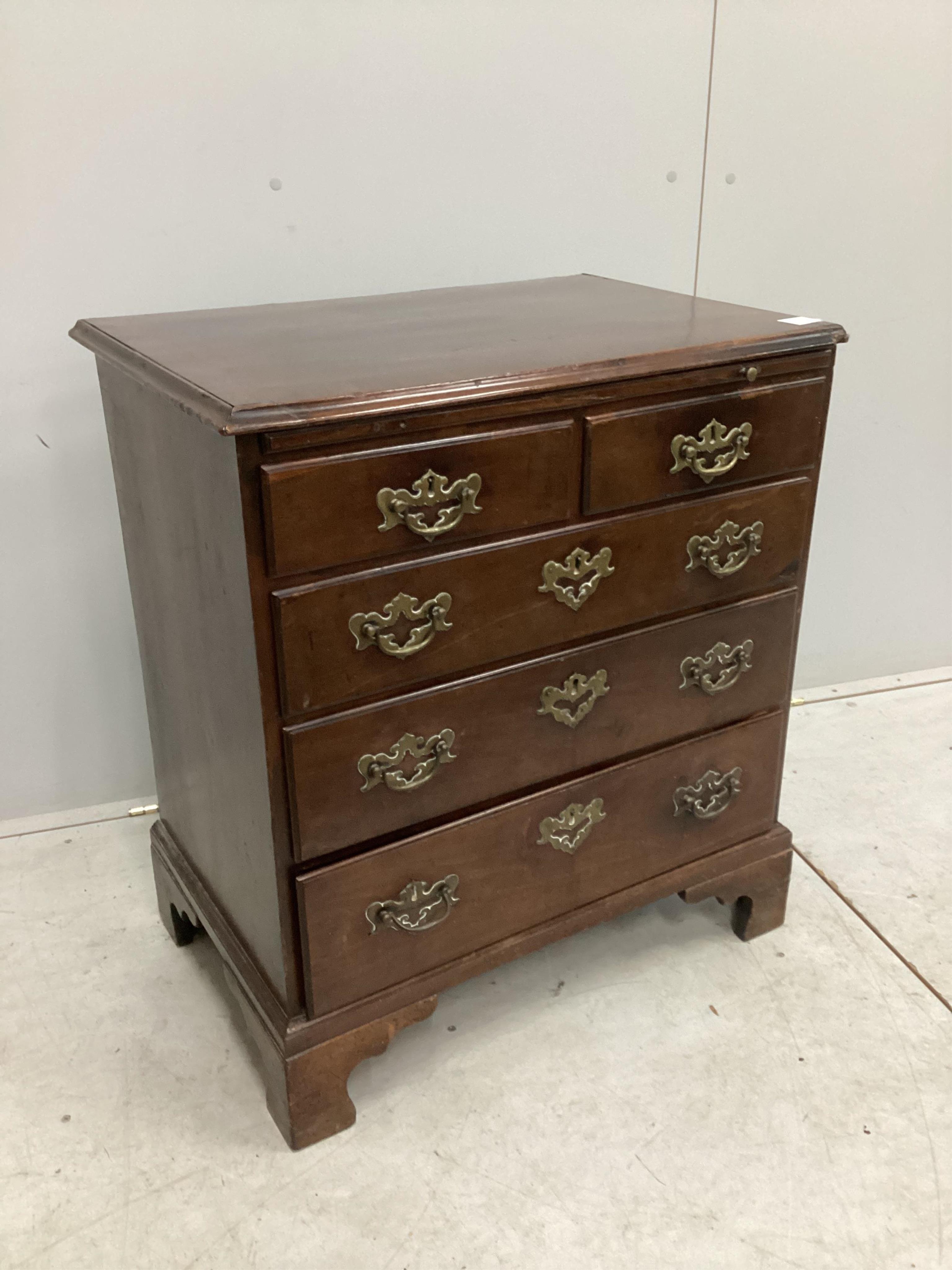 A small George III mahogany five drawer chest with brushing slide, width 70cm, depth 48cm, height 78cm. Condition - fair